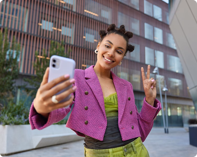 Influencer recording a short video on a smartphone